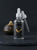 Layal Aura Men's Massage Oil 50 ml glass dropper bottle with black and gold label.